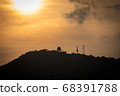 Silhouette of a Weather station on the mountain  68391788