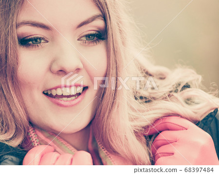 Portrait of pretty smiling woman in jacket. Portrait of pretty smiling woman in jacket. 68397484