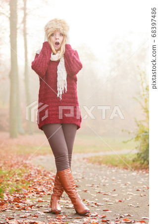 Pretty amazed fashion woman in fur winter hat. Pretty amazed fashion woman in fur winter hat. 68397486