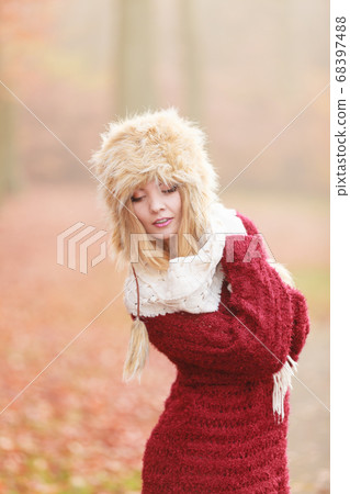 Pretty fashion woman in fur winter hat. Pretty fashion woman in fur winter hat. 68397488