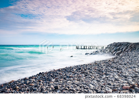 Storm damaged port pier at fishing village Vitt Storm damaged port pier at fishing village Vitt 68398024