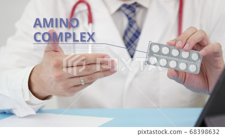 Medical doctor talks about Amino complex tablets in his office 68398632