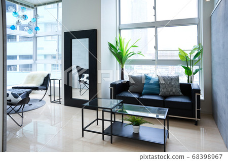 Living room with sofa and low table 68398967