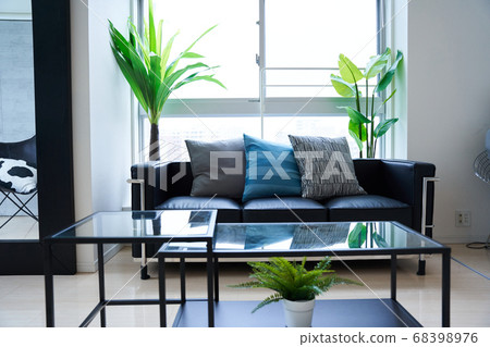 Living room with sofa and low table Living room with sofa and low table 68398976