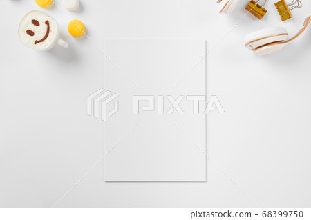 Top view feminine workspace with blank notepad page 68399750