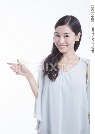 Woman pointing Woman pointing 68401592