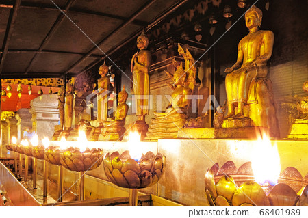 Buddha statue candle light in chaing mai Thailand Buddha statue candle light in chaing mai Thailand 68401989