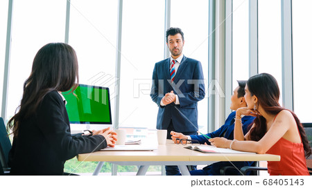 Business people in the conference room with green screen Business people in the conference room with green screen 68405143