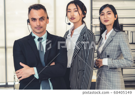 Business people wearing headset working in office 68405149