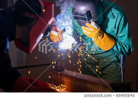 Metal welding steel works using electric arc welding machine Metal welding steel works using electric arc welding machine 68405648
