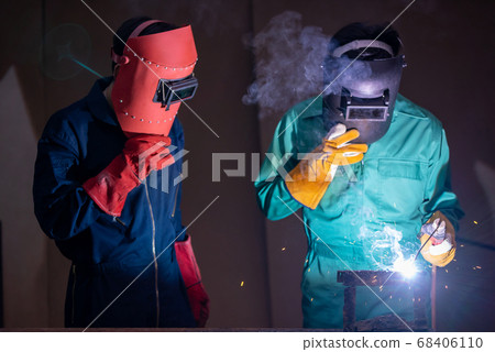 Metal welding steel works using electric arc welding machine Metal welding steel works using electric arc welding machine 68406110
