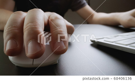 Close-up soft-focus finger typing on keyboard. Close-up soft-focus finger typing on keyboard. 68406136