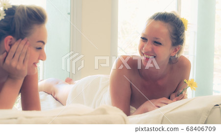 Two women at massage room in luxury day spa. 68406709