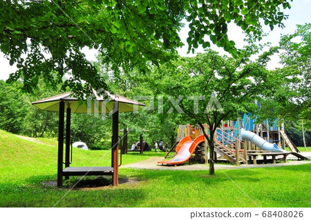 Kanagawa Prefectural Hadano Togawa Park Playground equipment and fresh greenery in the children's square 68408026