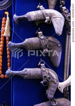 Omani souvenir half-moon sword (hanjar) Khanjar in Oman Omani souvenir half-moon sword (hanjar) Khanjar in Oman 68408347