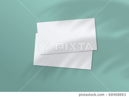Blank paper brochure mockup with palm tree shadow overlay on teal background Blank paper brochure mockup with palm tree shadow overlay on teal background 68408663