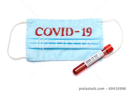 Blood test tube tube and medical protective mask with COVID-19 sign isolated on white background with clipping path 68410996