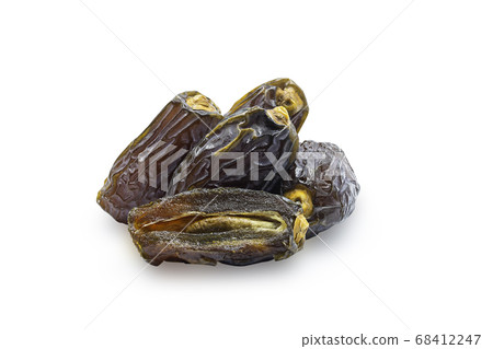 Dried Medjoul date fruit on white isolated Dried Medjoul date fruit on white isolated 68412247