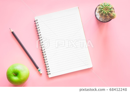 Pastel pink desk office with laptop, smartphone 68412248