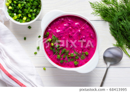 Soup from fresh young beetroot and cucumbers 68413995