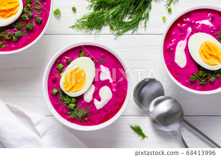 Soup from fresh young beetroot and cucumbers 68413996