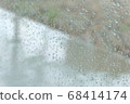 Water drops on glass on rainy day 68414174