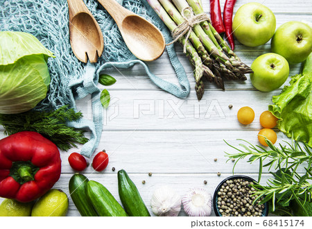 Fresh vegetables and fruits with a string bag Fresh vegetables and fruits with a string bag 68415174
