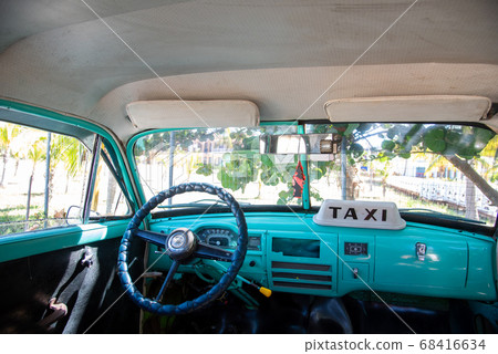 Taxi waiting at Ancon beach near Trinidad, Cuba 68416634