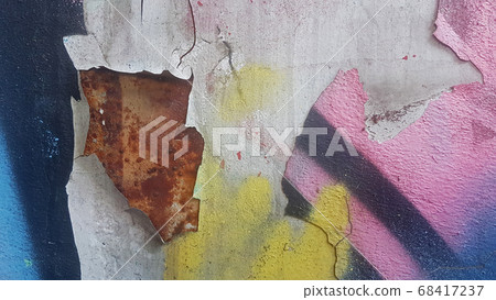 Old weathered colorful paint that separates from rusty metal and peels off Old weathered colorful paint that separates from rusty metal and peels off 68417237