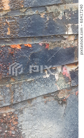 Old weathered colorful paint that separates from rusty metal and peels off Old weathered colorful paint that separates from rusty metal and peels off 68417240