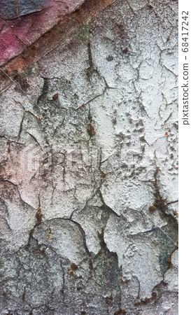 Old weathered colorful paint that separates from rusty metal and peels off Old weathered colorful paint that separates from rusty metal and peels off 68417242