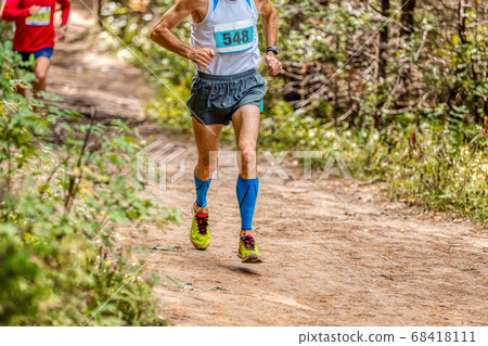 man athlete in compression sleeveless socks man athlete in compression sleeveless socks 68418111