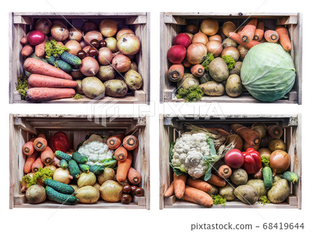 autumn harvest a variety of vegetables and root vegetables in wooden boxes autumn harvest a variety of vegetables and root vegetables in wooden boxes 68419644