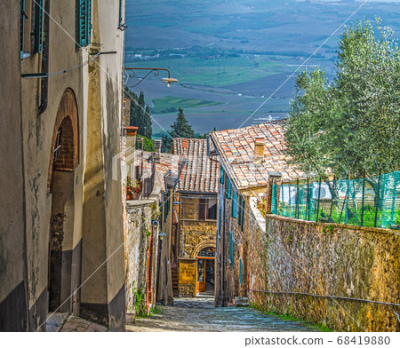 Narrow street in Montalcino 68419880