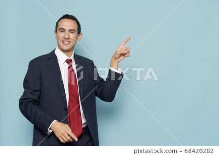 Official man in suit with tie professional gesture with hands CopySpace 68420282