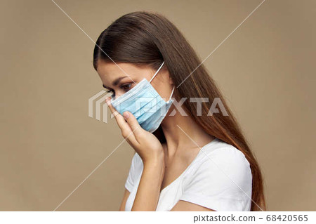 Pretty woman stylish clothes in a protective mask health  68420565