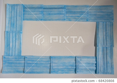 Disposable hygienic mask. New element that we have to carry in our daily lives because of the coronavirus (COVID-19) Disposable hygienic mask. New element that we have to carry in our daily lives because of the coronavirus (COVID-19) 68420808