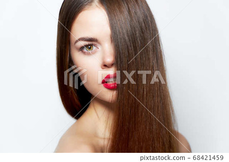 Brunette Attractive look red lips bared shoulders clear skin Brunette Attractive look red lips bared shoulders clear skin 68421459