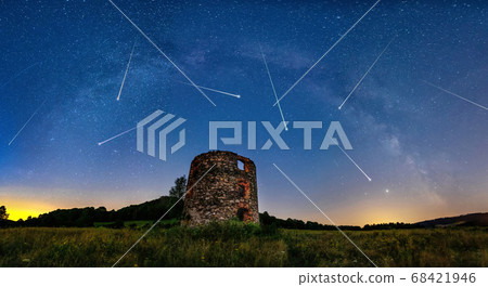 Meteor Shower and the Milky Way with old ruin 68421946
