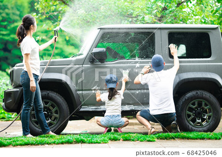 Family washing cars Family washing cars 68425046