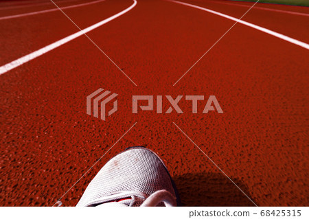 Run on the athletic stadium. Run, move forward, track, future, etc. Run on the athletic stadium. Run, move forward, track, future, etc. 68425315