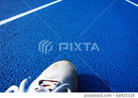 Run on the athletic stadium. Run, move forward, track, future, etc. Run on the athletic stadium. Run, move forward, track, future, etc. 68425316