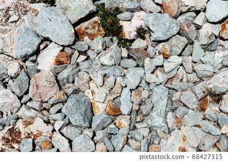 Coarse grinding granite rock stone on the ground 68427315