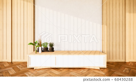 tropical room interior with cabinet and plants 68430288