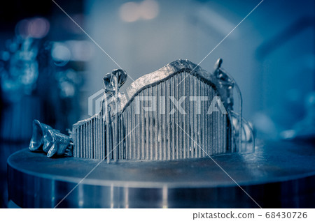 Object printed on metal 3d printer close-up 68430726