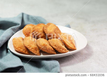 Typical Colombian empanadas usually served with Typical Colombian empanadas usually served with 68431036