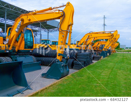 Excavators on road at Kyiv, Ukraine 68432127