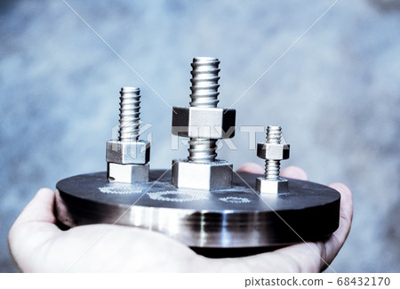 Man is holding object printed on metal 3d printer. 68432170