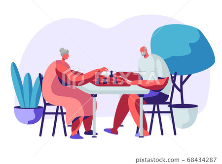 Relaxing Senior Man and Woman Playing Chess 68434287
