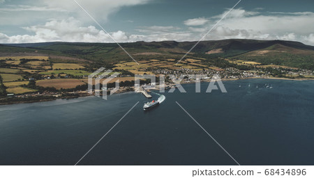 Scotland, Brodick Ferry Terminus aerial panorama shot of ship crossing, Arran Island. Scottish scape Scotland, Brodick Ferry Terminus aerial panorama shot of ship crossing, Arran Island. Scottish scape 68434896